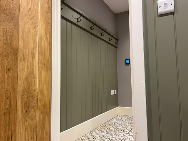 Decorative wall panelling fitted in a hallway